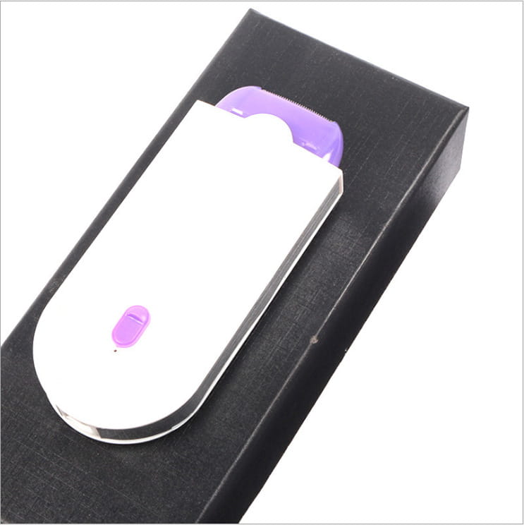 White and purple induction type lady hair removal device electric epilator with sleek modern design for efficient hair removal.