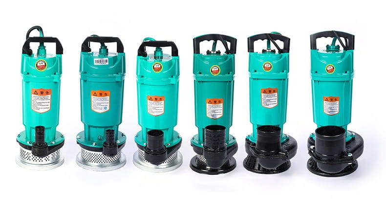 six identical teal large flow small agricultural industrial submersible pumps with black handles and bases each featuring a circular warning label on the side
