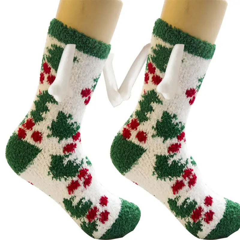 white and green christmas supplies magnetic suction couple socks featuring red berry accents and a plush soft texture designed as warm slippers.