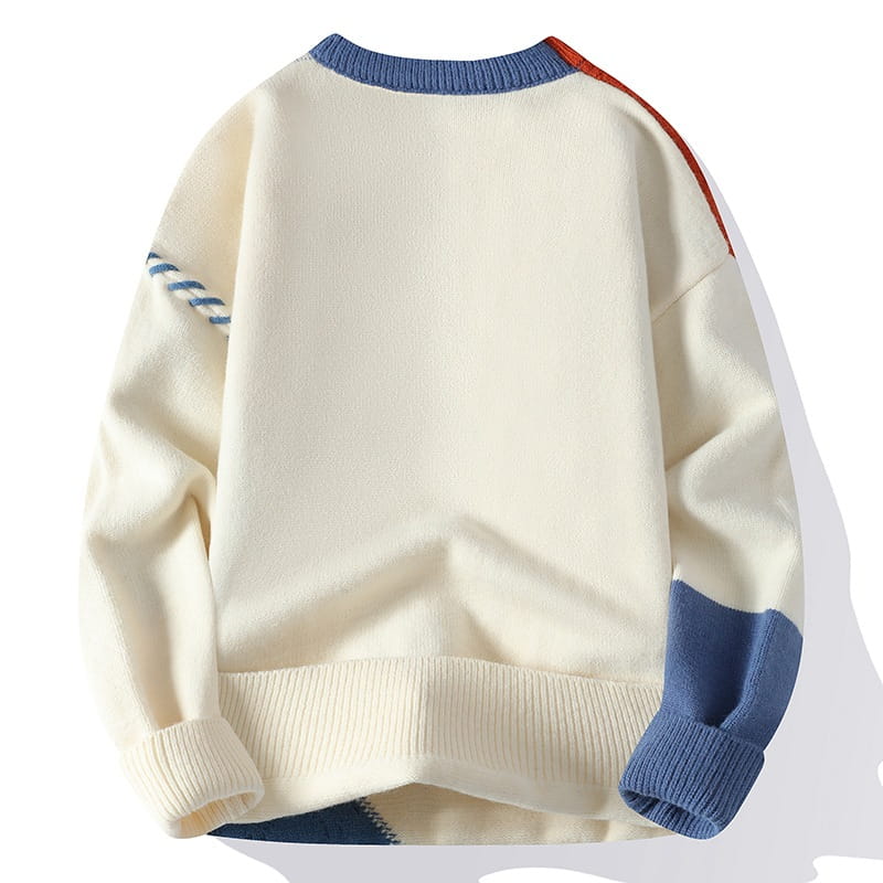 Cream-colored ins colorblock pullover knit sweater with blue and orange accent stripes on the shoulders and ribbed cuffs and hem designed for winter fashion.