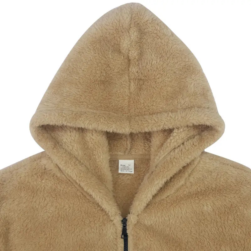 tan plush hooded jacket with soft plush texture and black zipper pull designed as a zipper loose casual coat to wear warm.