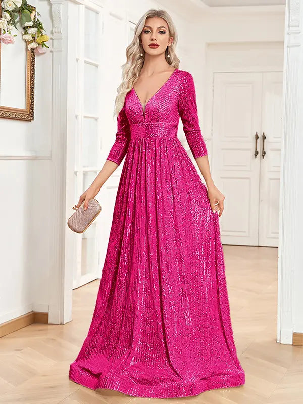 a vibrant fuchsia sequined evening gown with a v-neckline and three-quarter sleeves designed as a high waist party formal dress