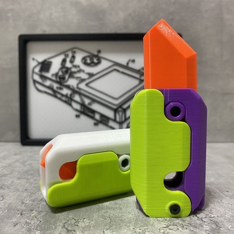 vibrant multicolored 3d-printed radish knife gravity cub toy with lime green and purple body accented by orange and white sections designed for gravity cub jumping.