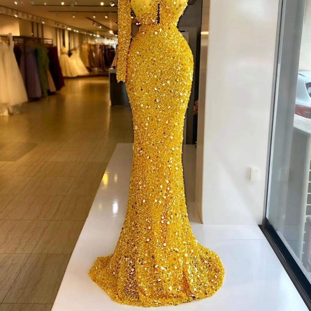 a dazzling gold sequined pearl embroidery lace asymmetric dress featuring long sleeves and a fitted mermaid silhouette