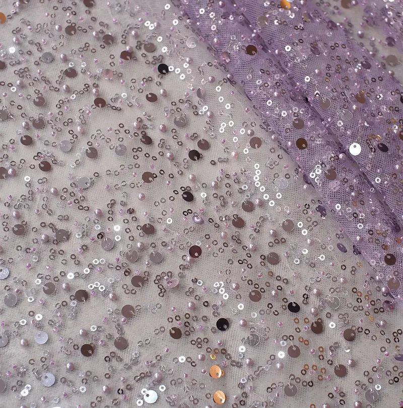 lavender sheer fabric of a sequined pearl embroidery lace asymmetric dress adorned with scattered silver rose gold and black sequins