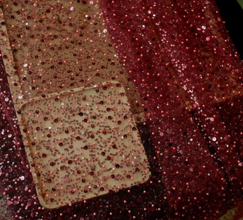 a sparkly red sequined phone case with a clear glittery flap complementing a product titled sequined pearl embroidery lace asymmetric dress