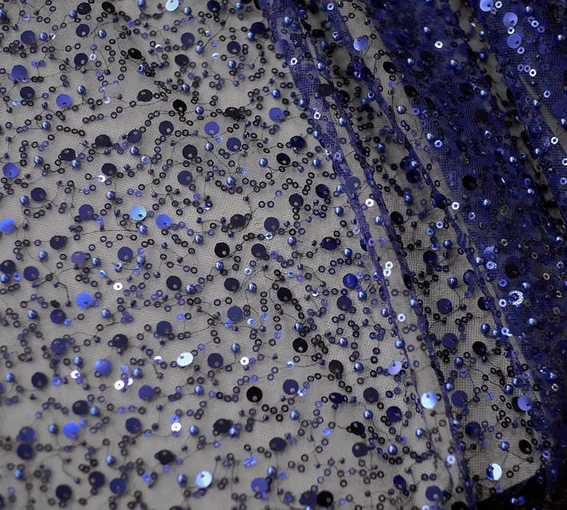 blue and black sequined pearl embroidery lace sheer fabric featured in a sequined pearl embroidery lace asymmetric dress