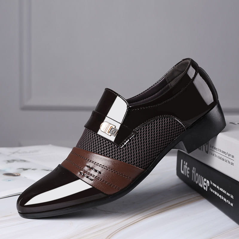 Black and white mesh patent leather shoes featuring black and brown leather shoes with a mesh panel, white stripe accent, and silver buckle.