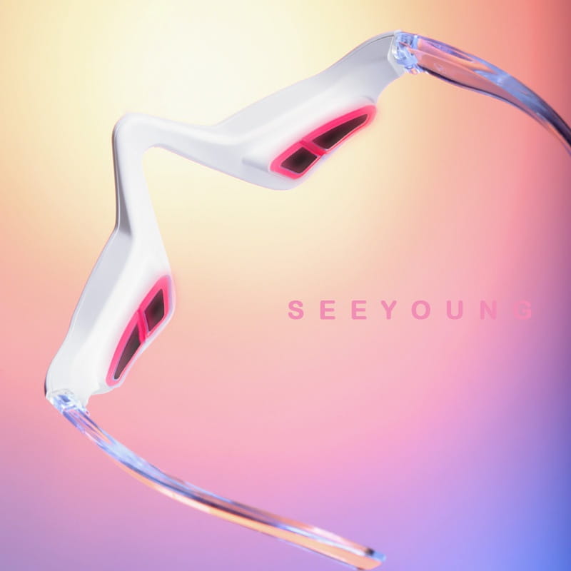 White and pink seeyoung wireless earpiece with transparent arms featured as part of the white winged eye care machine for machine household eye care use.