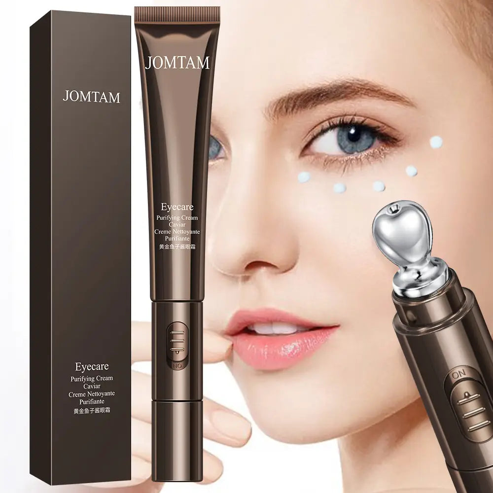 Jomtam eye care purifying cream in a sleek brown tube with caviar-infused formula is displayed beside its matching box and a silver-toned facial device designed to improve eye bags and provide eye bags firming benefits.