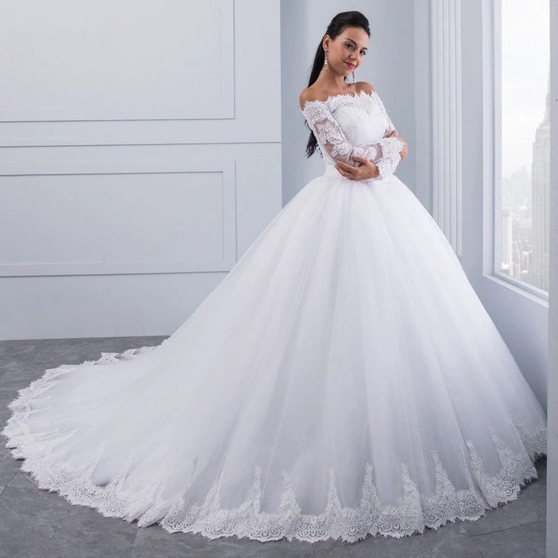 white off-the-shoulder bridal wedding lace gown featuring long lace sleeves and a voluminous tulle skirt perfect for a wedding lace large celebration