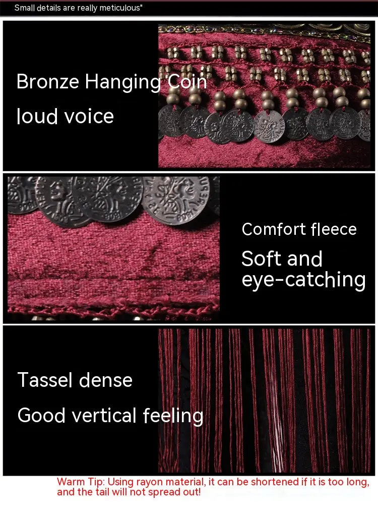 A rich burgundy velvet belly dance waist scarf with bronze hanging coins, intricate metallic detailing, and dense tassels designed for belly dance use.