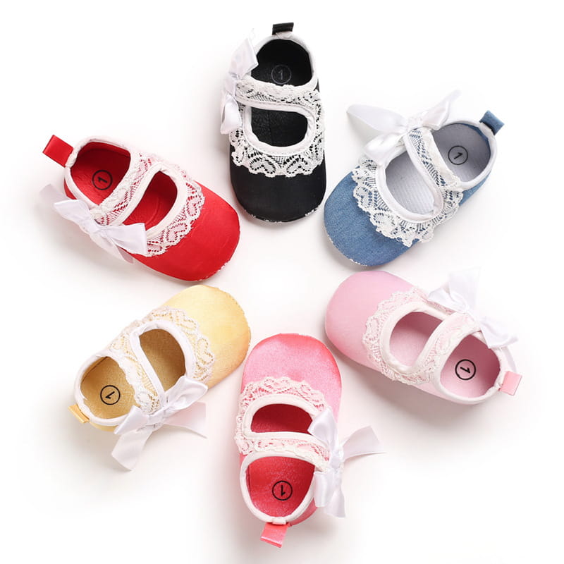 soft colorful princess shoes baby in red black blue yellow and pink featuring delicate white lace trim and a matching bow on the strap for baby toddler shoes