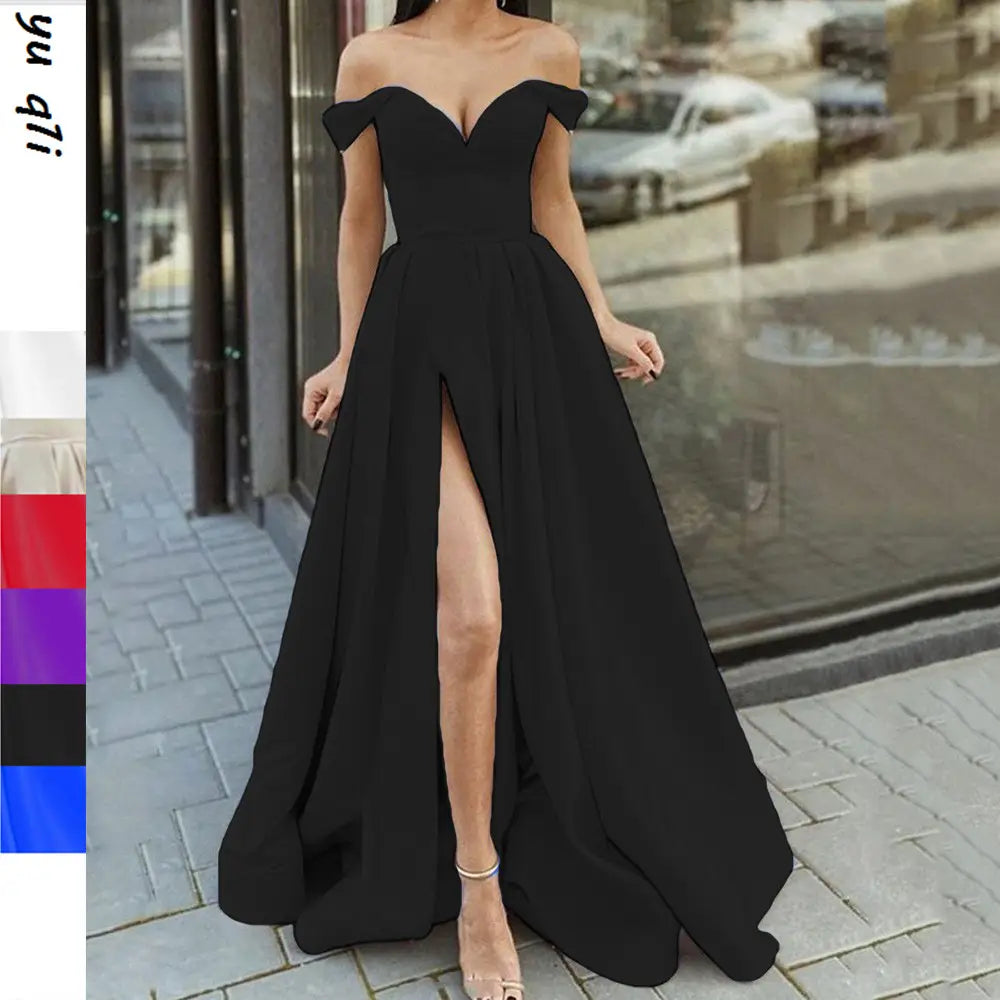 black off-the-shoulder floor-length gown with a high slit and flowing fabric featuring a large swing split sleeveless design in satin material.