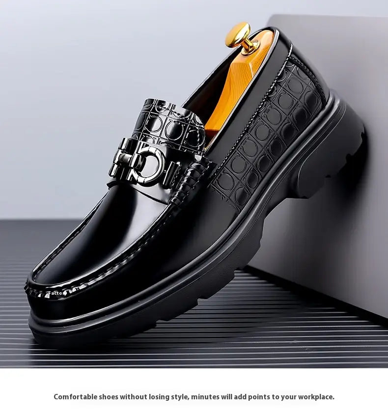 black patent leather loafers with a crocodile embossed pattern and gold tone metal buckle feature a chunky rubber sole in a platform retro casual design ideal for retro casual shoes.