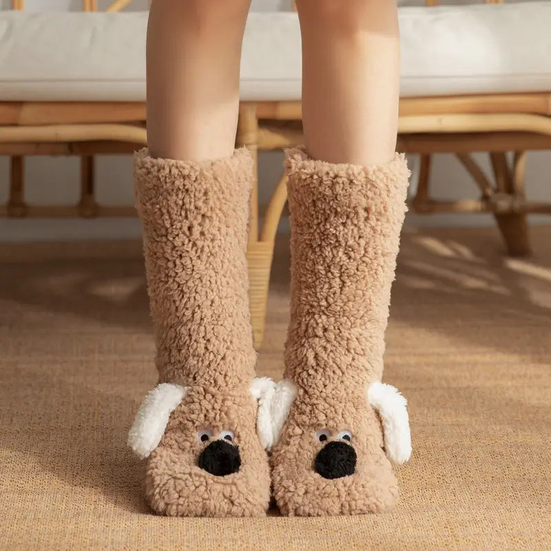 cute cartoon dog floor socks made of plush beige fabric with white floppy ears and black nose details designed as dog slippers for indoor use