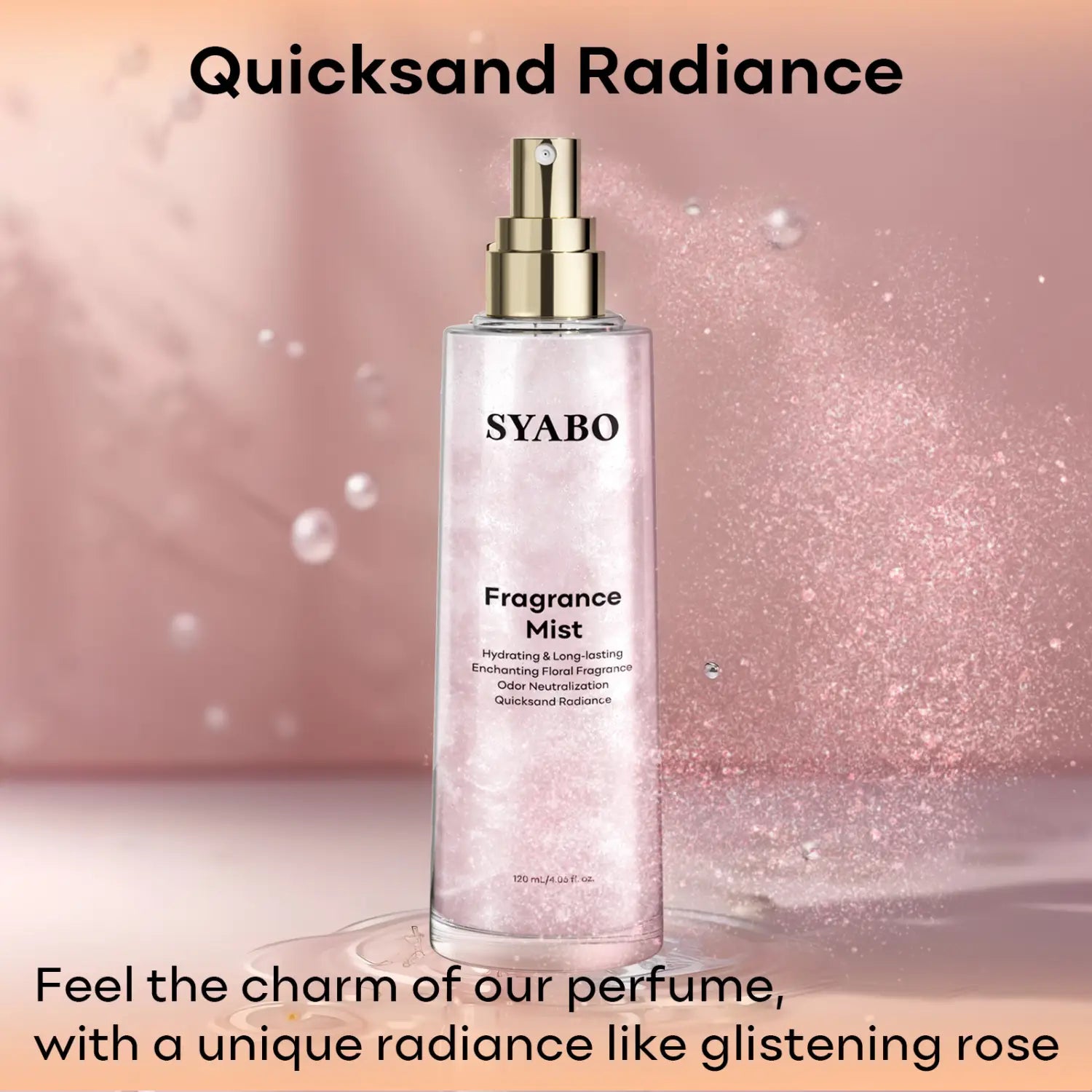 A clear glass bottle with a gold-tone spray nozzle containing light pink fragrant mist labeled syabo fragrance mist from the dream quicksand body spray collection.