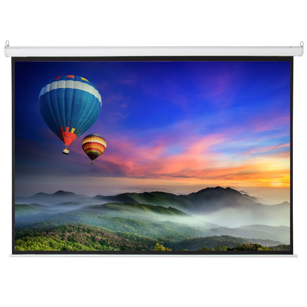 Matte white motorized projection screen with remote control and white frame displaying a vibrant hot air balloon image on the viewing area against a colorful sunset sky over misty mountains.