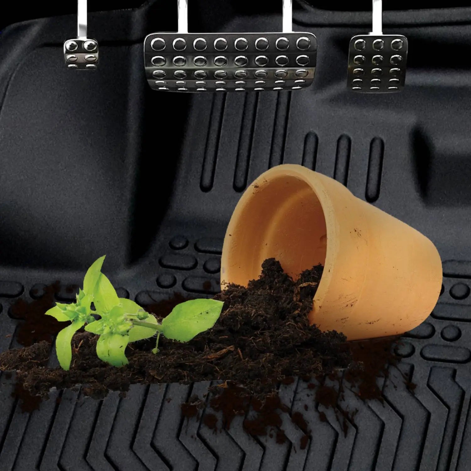 Terracotta pot with soil and green plant spilling from it placed on tpe rubber floor mats for 2018 2023 camry non hybrid and camry hybrid models.