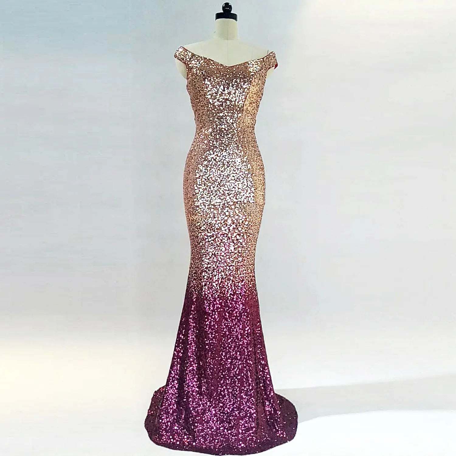 a shimmering rose gold to deep magenta sequined long slim fit mermaid gown with an off-the-shoulder neckline designed for fit fashion hosts