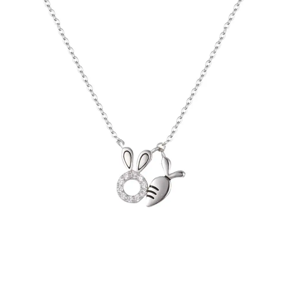 18k gold plated rabbit pendant necklace featuring a silver bunny with a carrot and a sparkling circular charm
