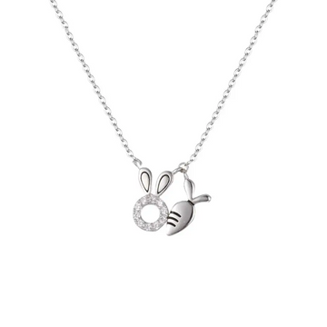 18k gold plated rabbit pendant necklace featuring a silver bunny with a carrot and a sparkling circular charm