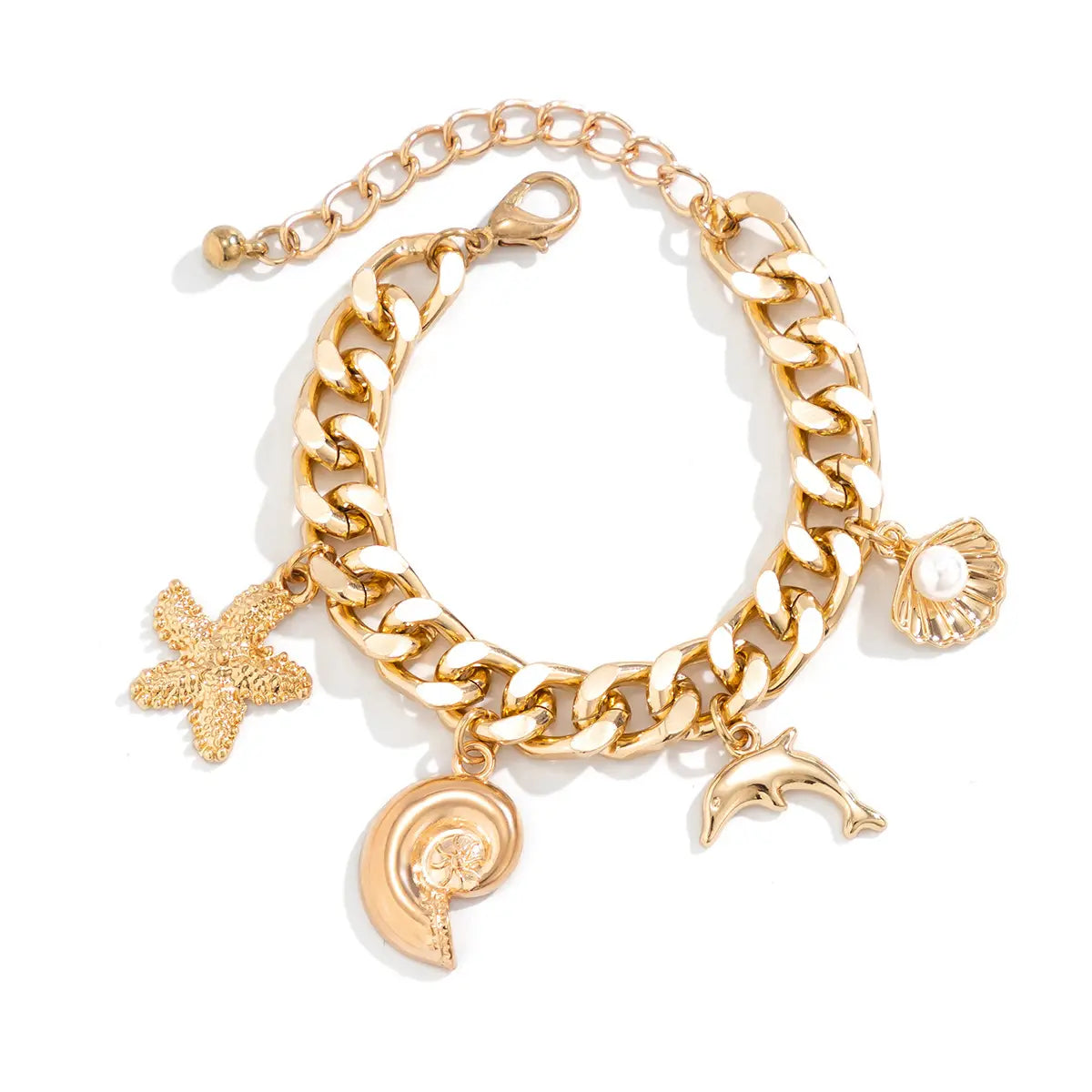 gold-toned chunky chain bracelet adorned with sea-themed charms including starfish seashell conch dolphin and spiral shell from a boho conch dolphin starfish choker necklace bracelet set.