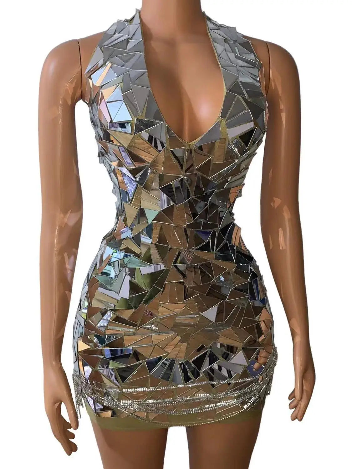 A shimmering form-fitting mini dress for nightclub dj female made of reflective geometric mirror pieces with a halter neckline and embellished hem.