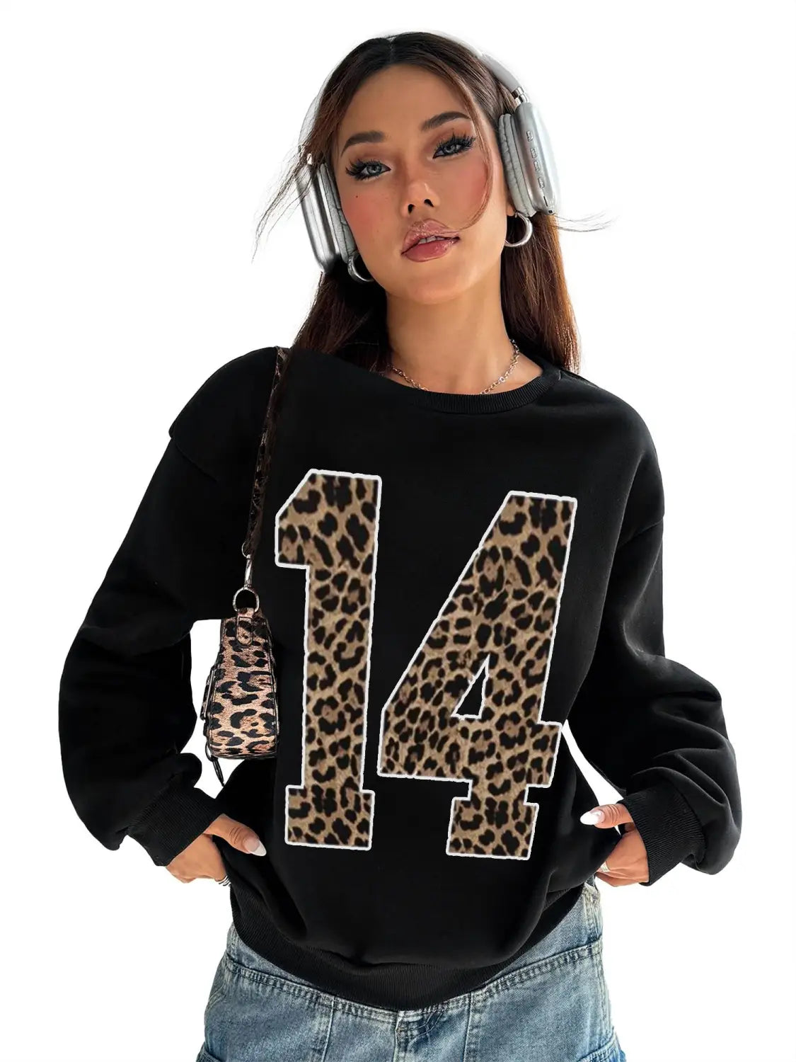 Black crew neck sweatshirt featuring a bold leopard print number 14 with white trim on the front.