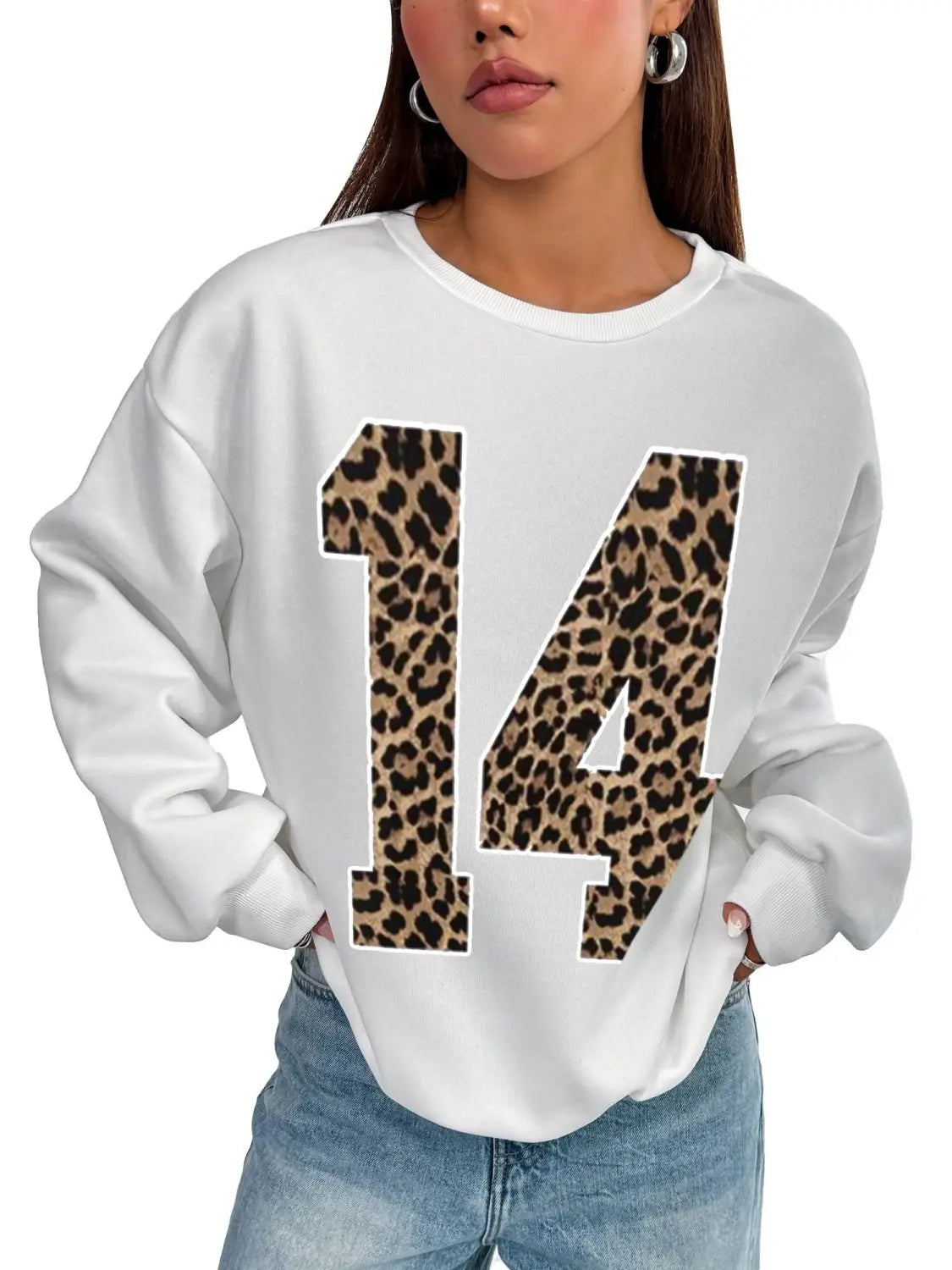 white crew neck sweatshirt featuring a bold black leopard print number 14 on the front