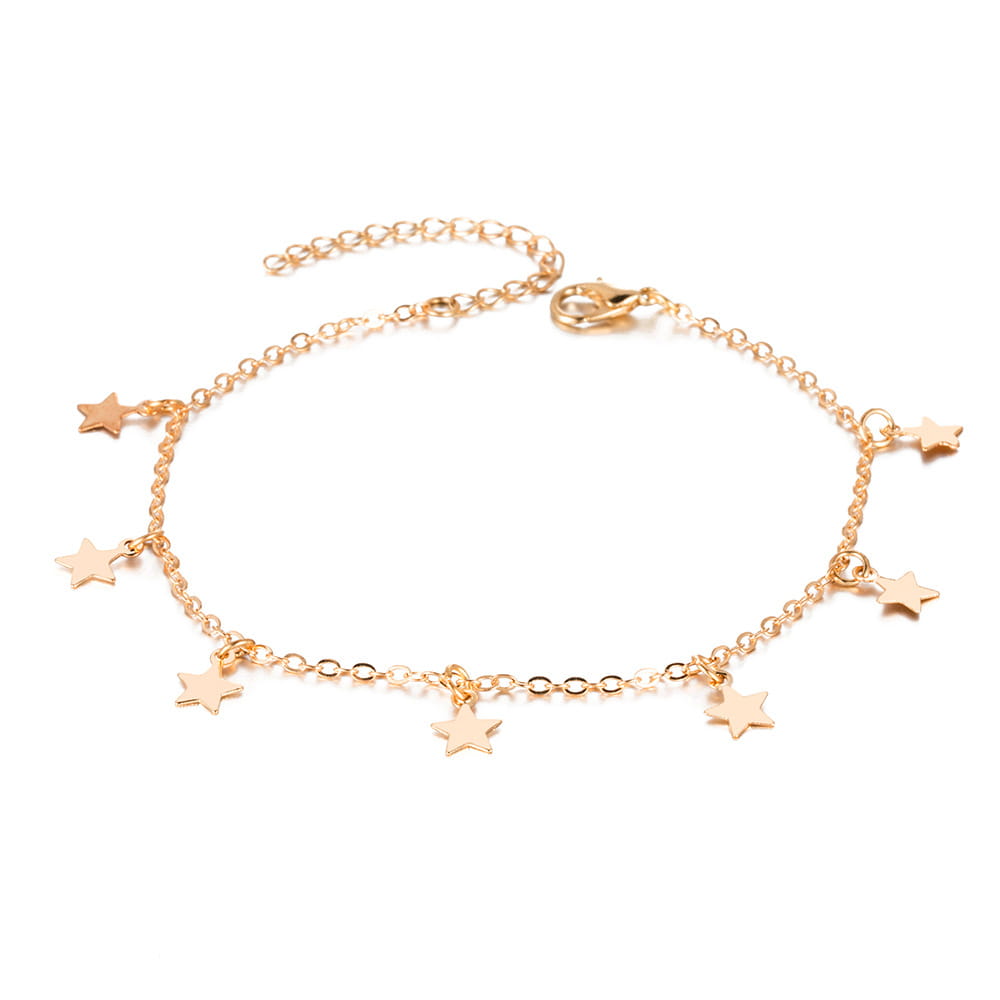 Gold-toned star charm anklet with delicate chain and lobster clasp, a simple star fashion anklet perfect for fashion anklet jewelry collections.