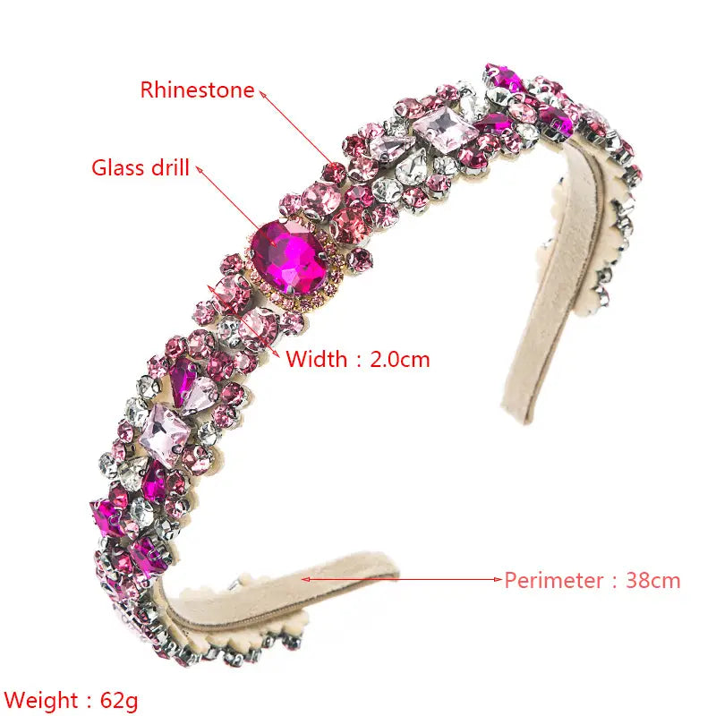 a baroque vintage court style headband featuring sparkling pink and clear rhinestones set on a delicate beige fabric band