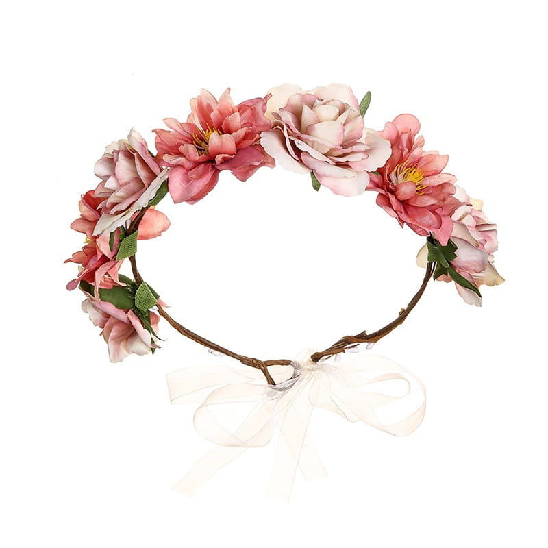 A delicate fabric colorful rose flower garland hair accessory featuring artificial pink and white blossoms, green leaves, a brown twig base, and a sheer white ribbon bow.