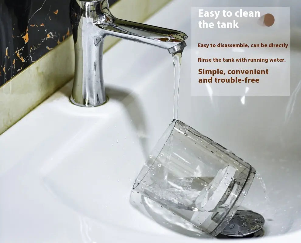 chrome-finished faucet with a sleek modern design dispensing water into a clear glass featured alongside an electric makeup brush cleaner with digital timer for efficient makeup brush cleaning.