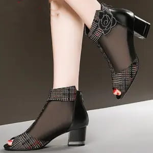 black rhinestone rose sandals mesh fish mouth heels featuring a black mesh peep-toe ankle boot with block heel and floral embellishment