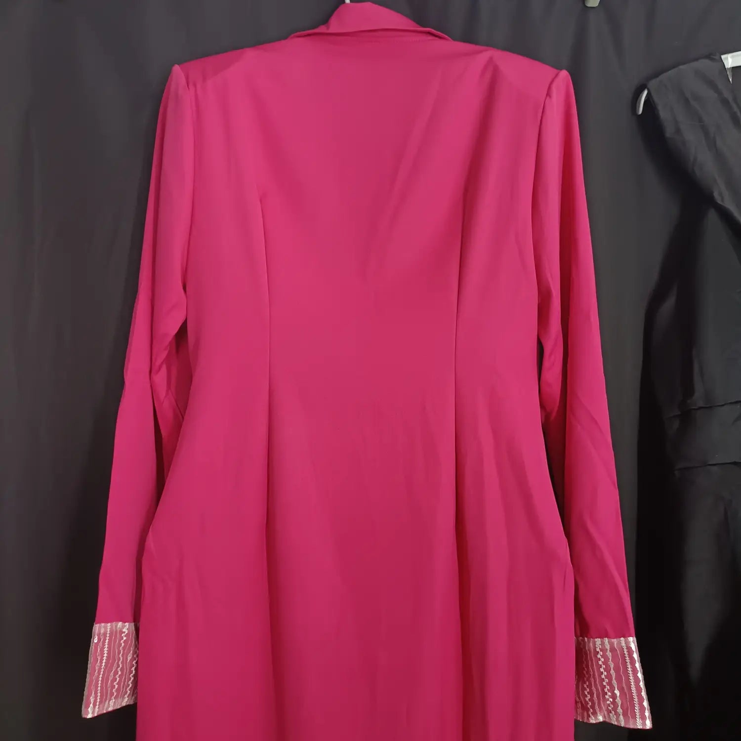 a vibrant fuchsia blazer with long sleeves and tailored fit featuring decorative striped cuffs complements the rose red suit collar embellished wrap dress design