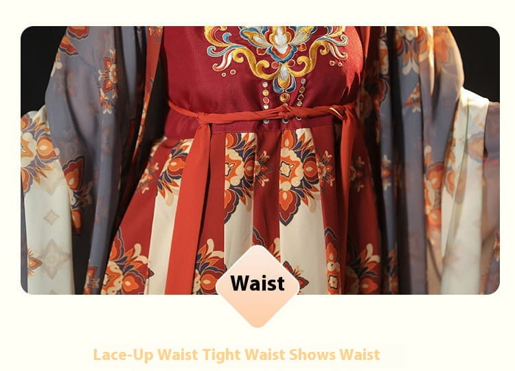 red tang imperial han chinese clothing recovery dress featuring intricate gold and orange floral embroidery and a lace-up waistband tied in a bow.