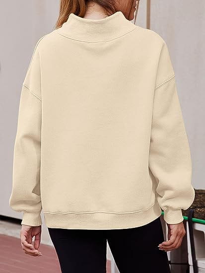 cream-colored oversized crewneck pullover sweatshirt solid color with relaxed fit and ribbed cuffs