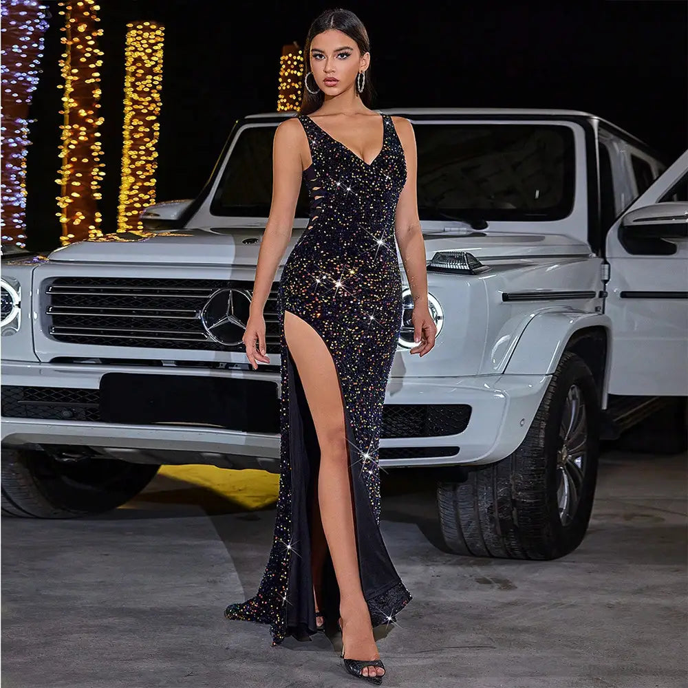 black high slit sequined evening dress featuring a shimmering black sequined fabric with a plunging v-neckline and sparkling embellishments that catch the light