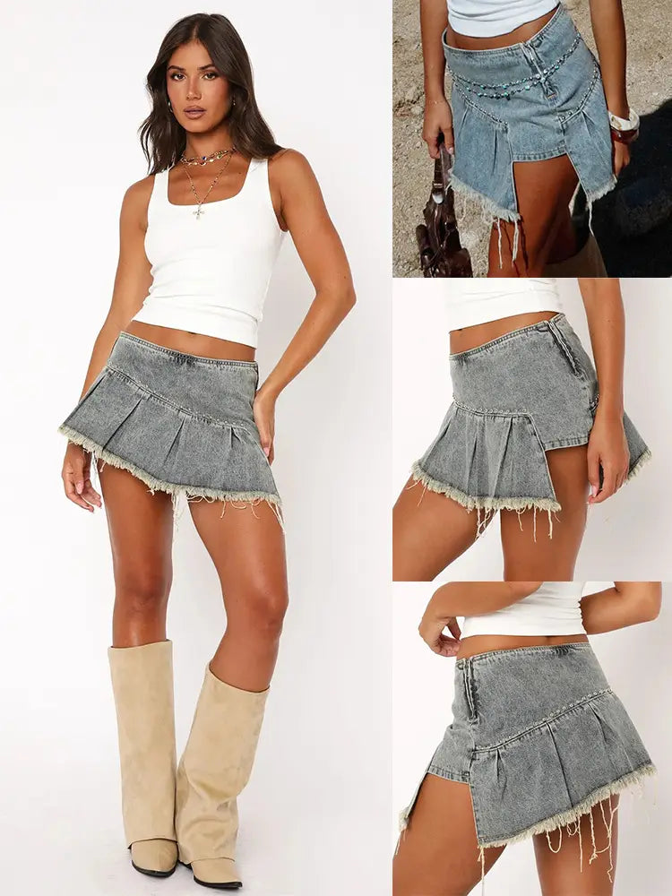 a distressed denim skirt featuring a rivet irregular pleated design with a flared silhouette and frayed hem in a mini length