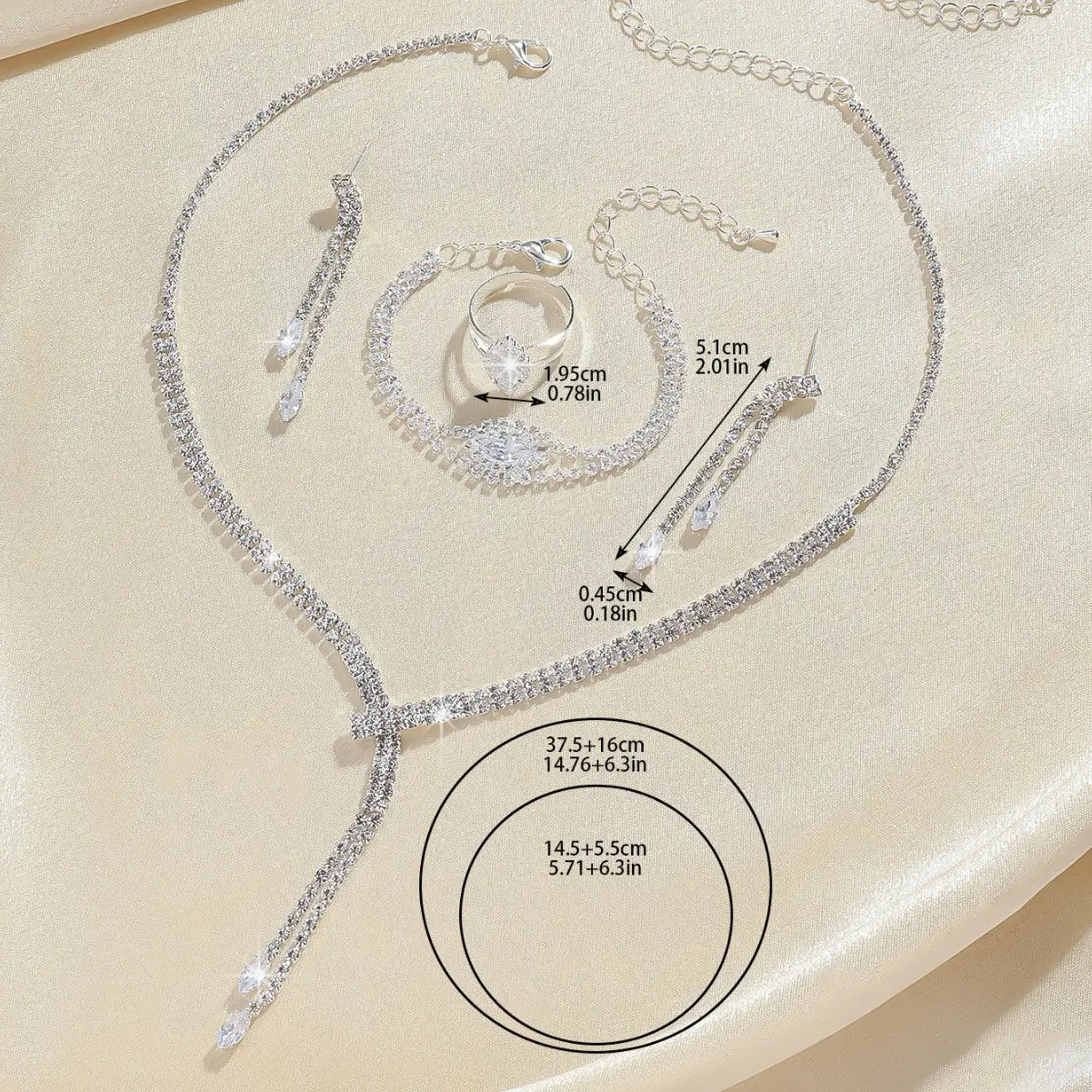 A fashion simple necklace featuring a sparkling silver design with clear crystal cascades and delicate chain links from a simple necklace earring bracelet set.