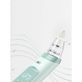 A sleek mint-green nasal aspirator baby with transparent silicone tip and digital display for blackhead remover use