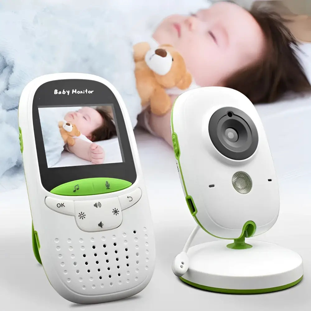 White and green 2 inch wireless intercom baby video monitor with handheld receiver showing live feed of sleeping infant