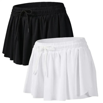 Two pack flowy athletic shorts in black and white with pleats elastic waistbands and drawstrings for gym yoga