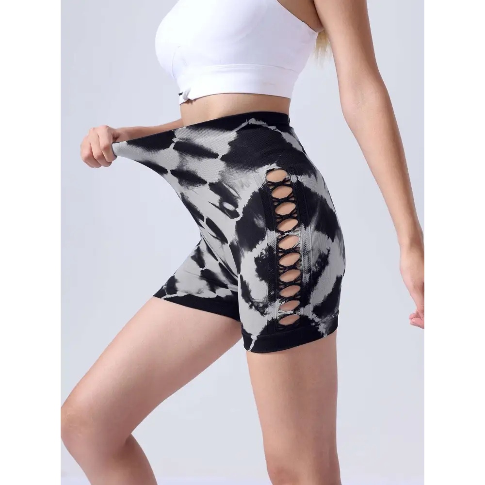 Black and white tie dye high waist seamless athletic shorts with side lace up detail for seamless hip lift in a 2 pack tie dye set