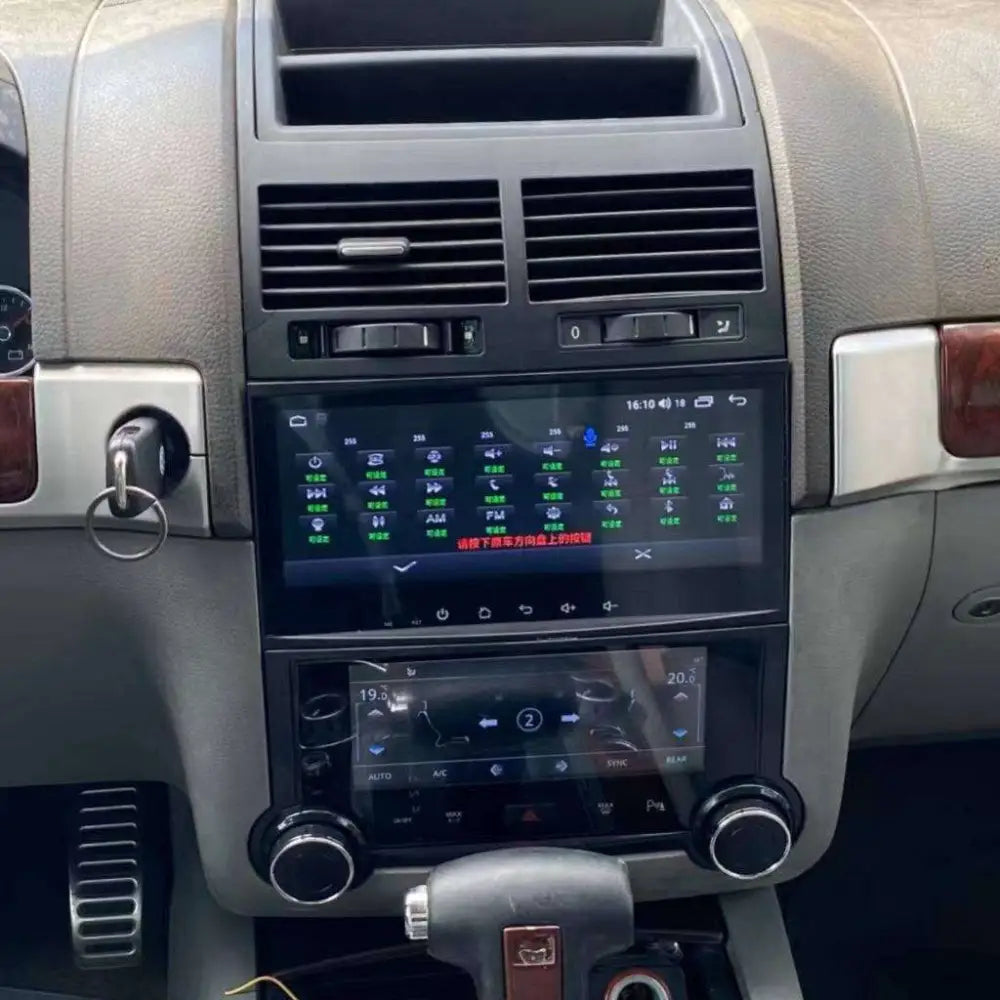 Black dual-screen touchscreen car stereo with silver trim and circular knobs for 2003 touareg android smart navigation