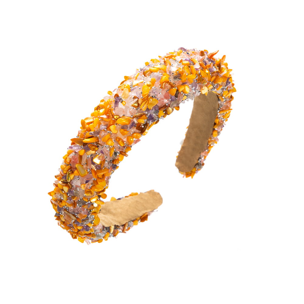 baroque colorful headband featuring an open-ended design adorned with a mosaic of amber-colored and translucent sparkling gemstones