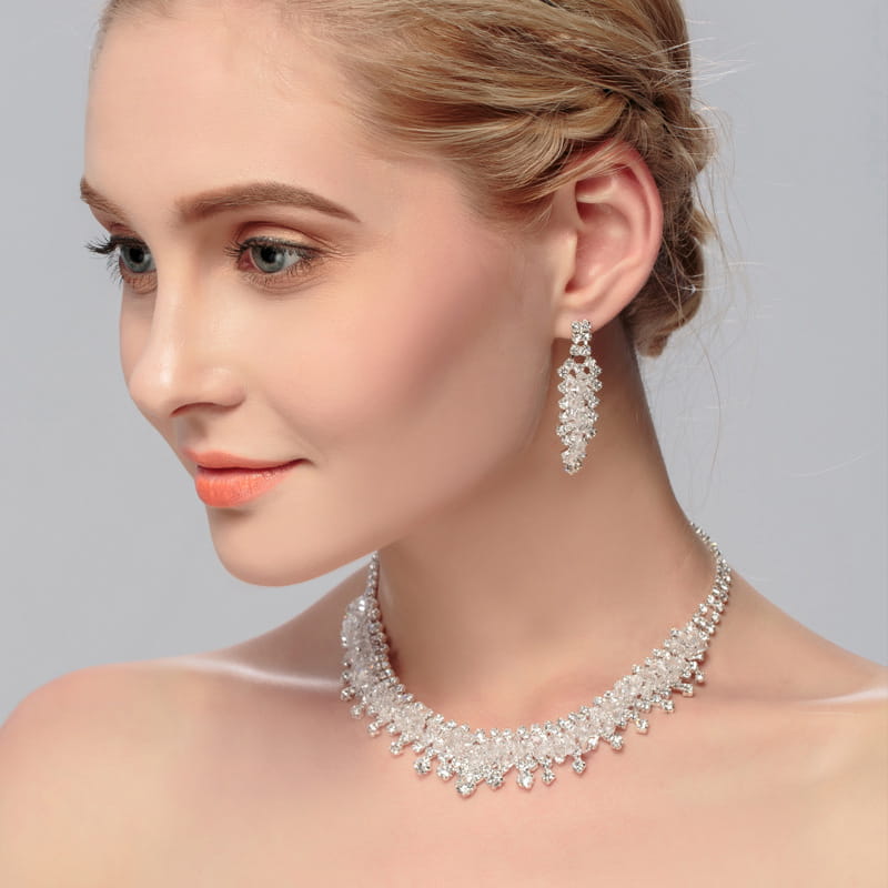 silver crystal choker wedding jewelry set featuring a sparkling silver choker necklace adorned with cascading crystals and intricate detailing as a wedding jewelry set