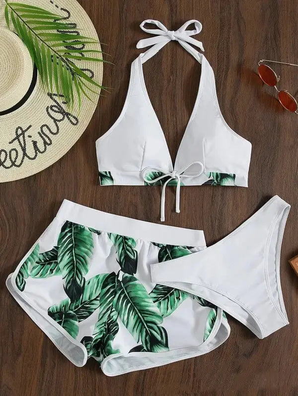 white halter top leaf print bikini set with green tropical leaves and matching high waisted shorts fashion summer in a 3pcs leaf print design