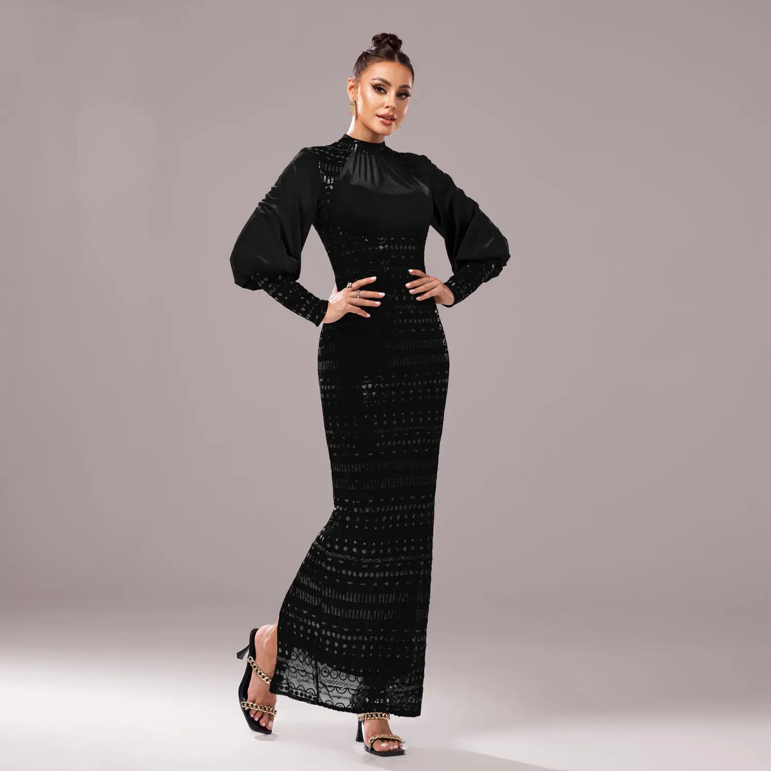 Black lace long sleeve round neck sequined maxi dress with long puffy sleeves and a high neckline.